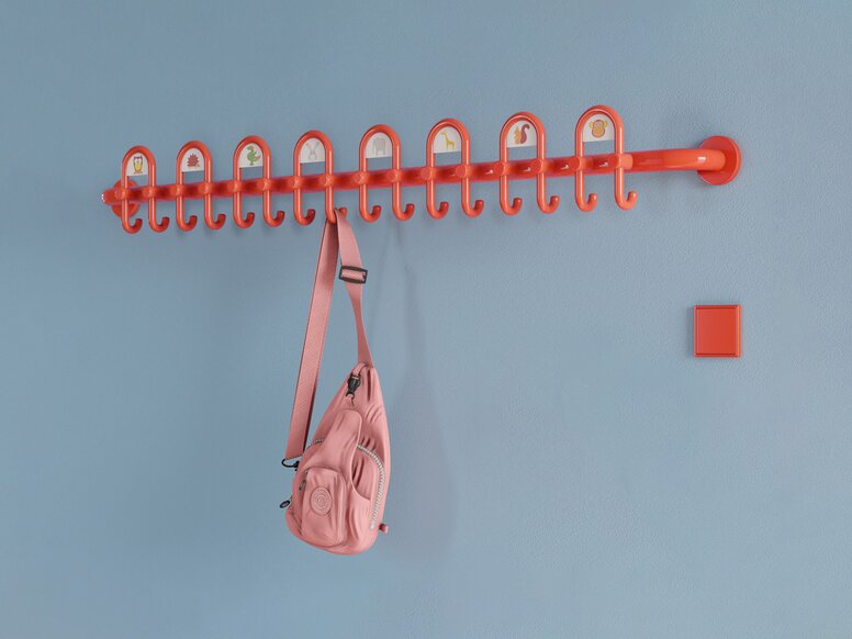 Colorful kindergarten equipped with fittings and wardrobe in the color orange