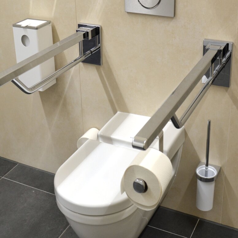 Museum for Architectural Drawings Toilet equipped with folding support handles, toilet brush set and System 800 hygiene waste garbage can